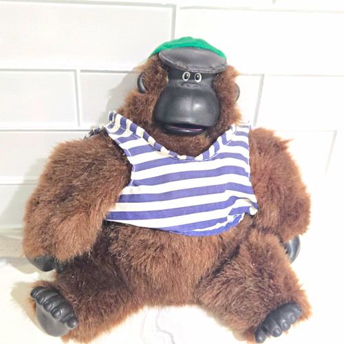 Plush gorilla sings the - sings,